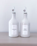 Ceramic White Bottles Olive Oil/Vinegar Silver Weighted Pourers 500ml image 0
